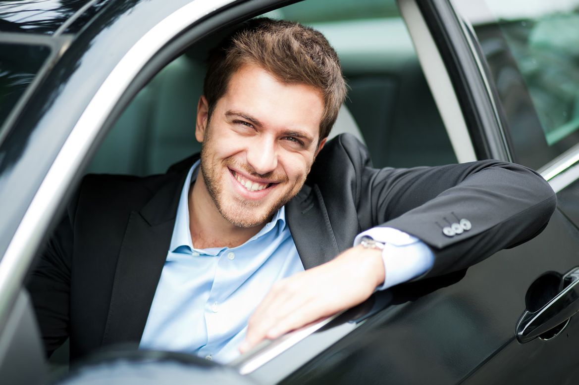 A chauffeur driver waiting for a pick up