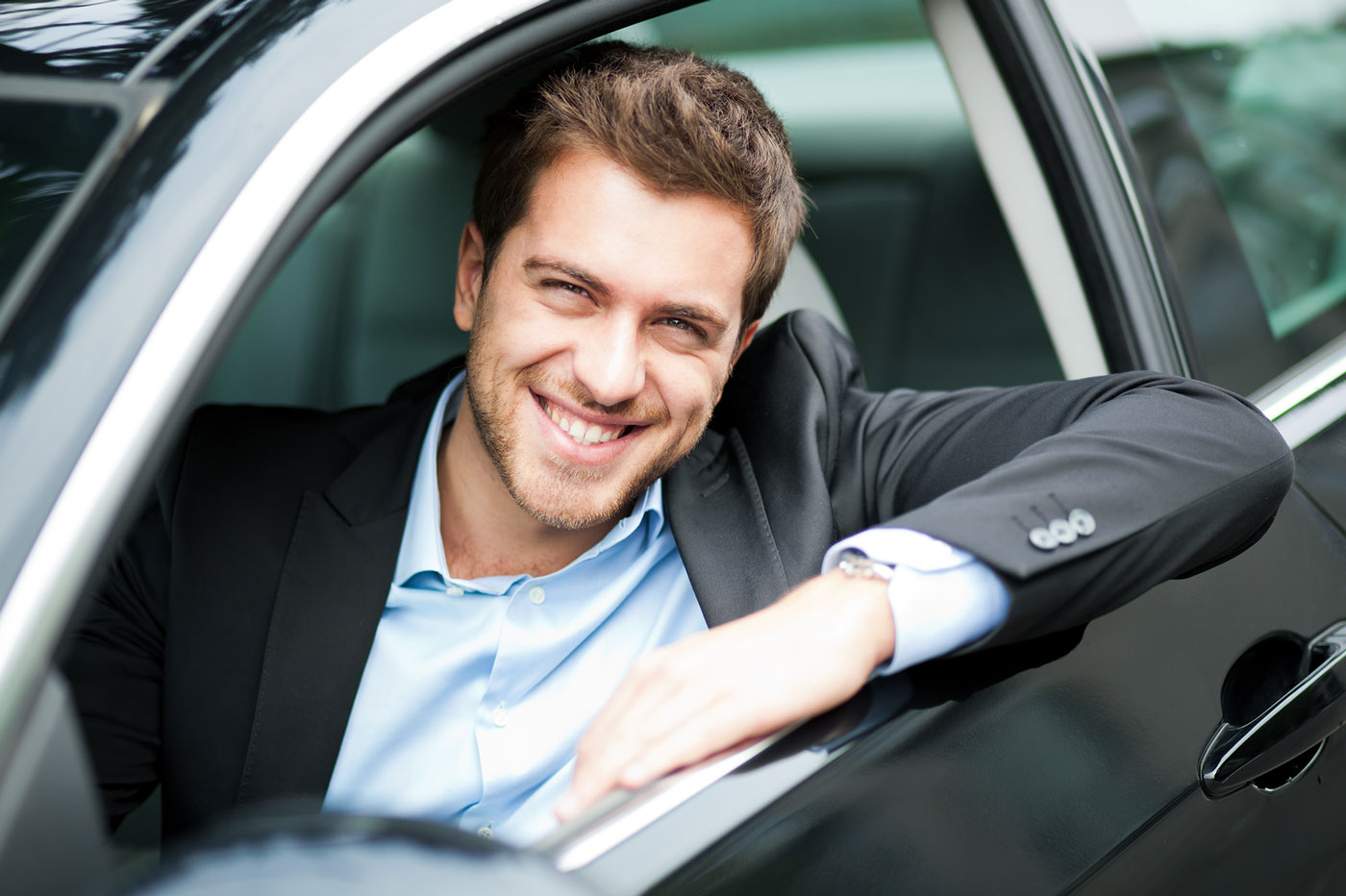 A chauffeur driver waiting for a pick up